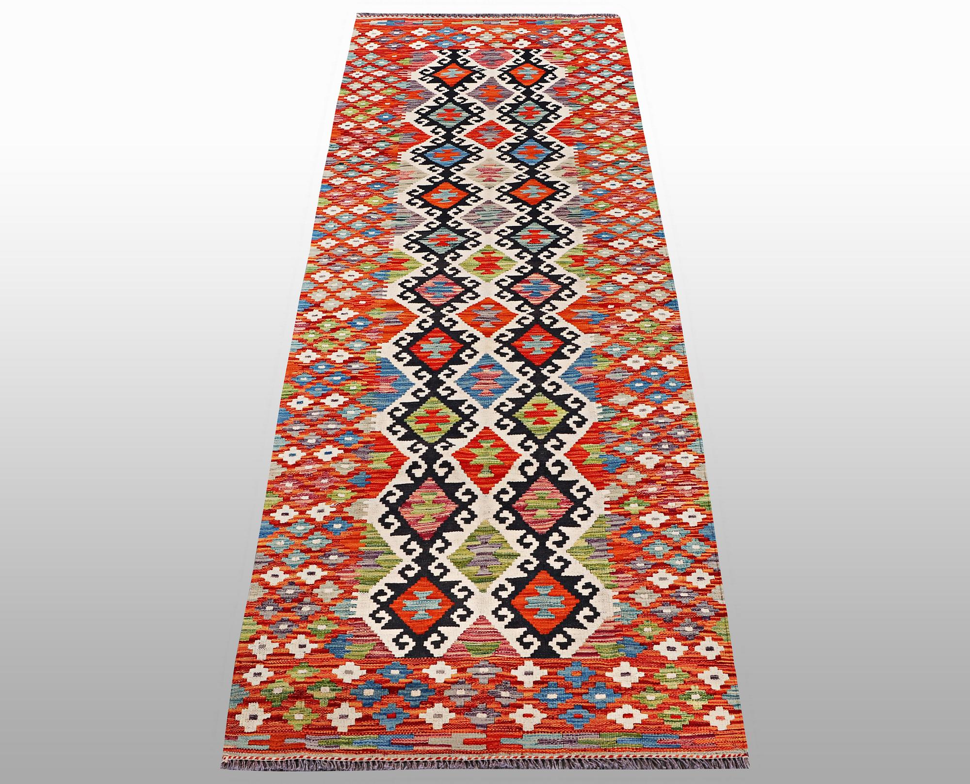 A runner kilim, ca 291 x 84 cm.
