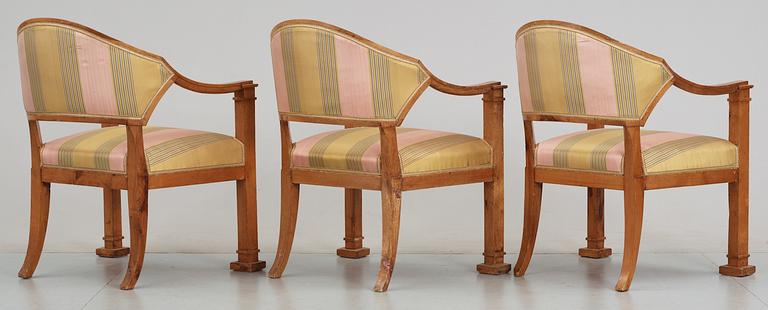 A set of Swedish Empire early 19th Century furniture comprising six armchairs, one sofa and one table.