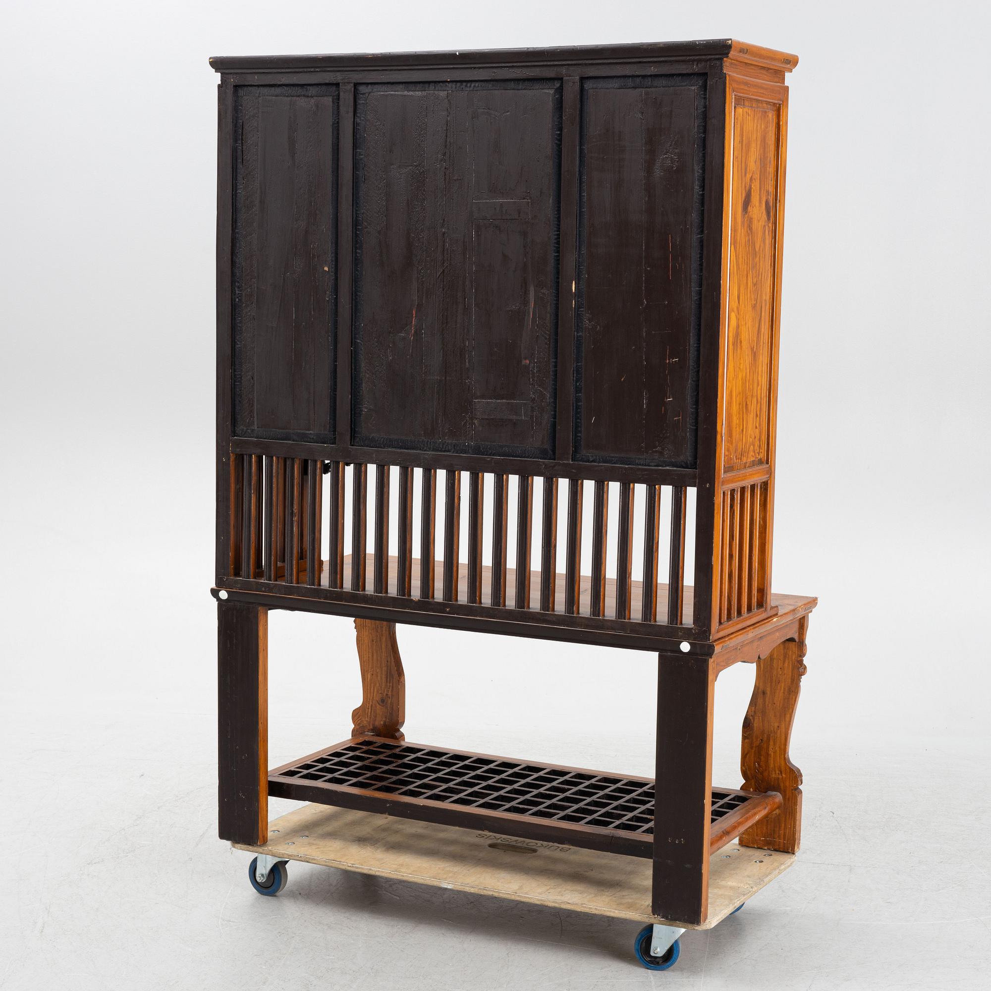 A Chinese hardwood cabinet, around 1900.
