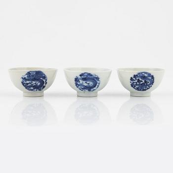 Six blue and white porcelain spoons and three cups, China, late Qing dynasty.