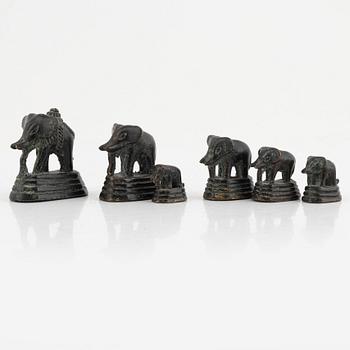 Six bronze opium weights, China/Southeast Asia, around 1900.