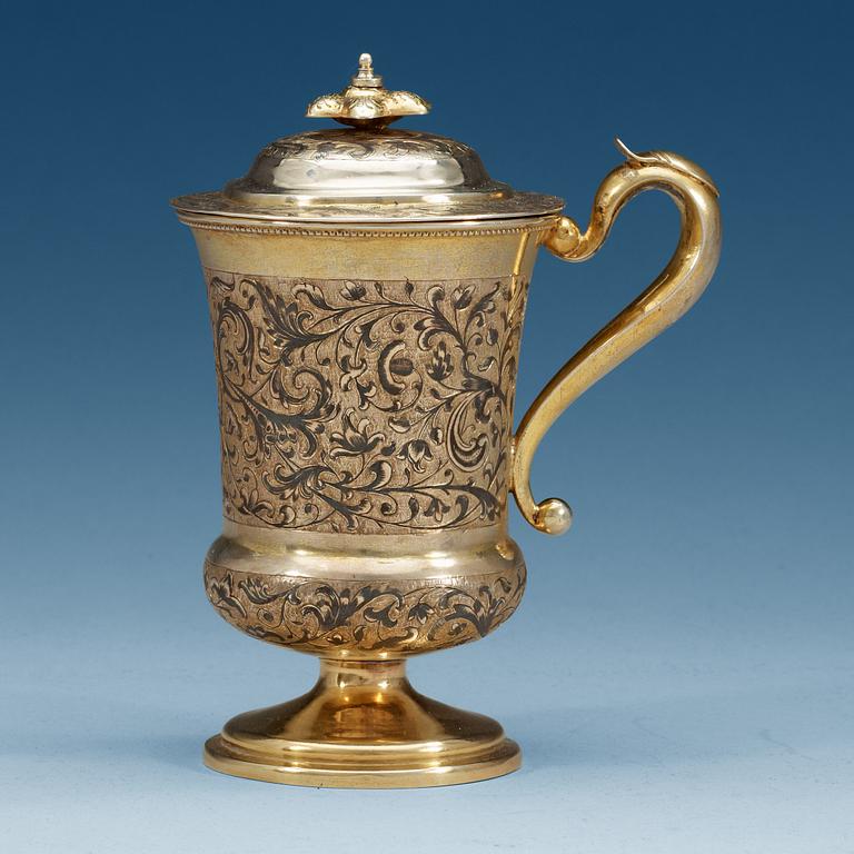 A Russian 19th century silver-gilt and niello cup and cover, unidentified makers mark, Moscow 1850.