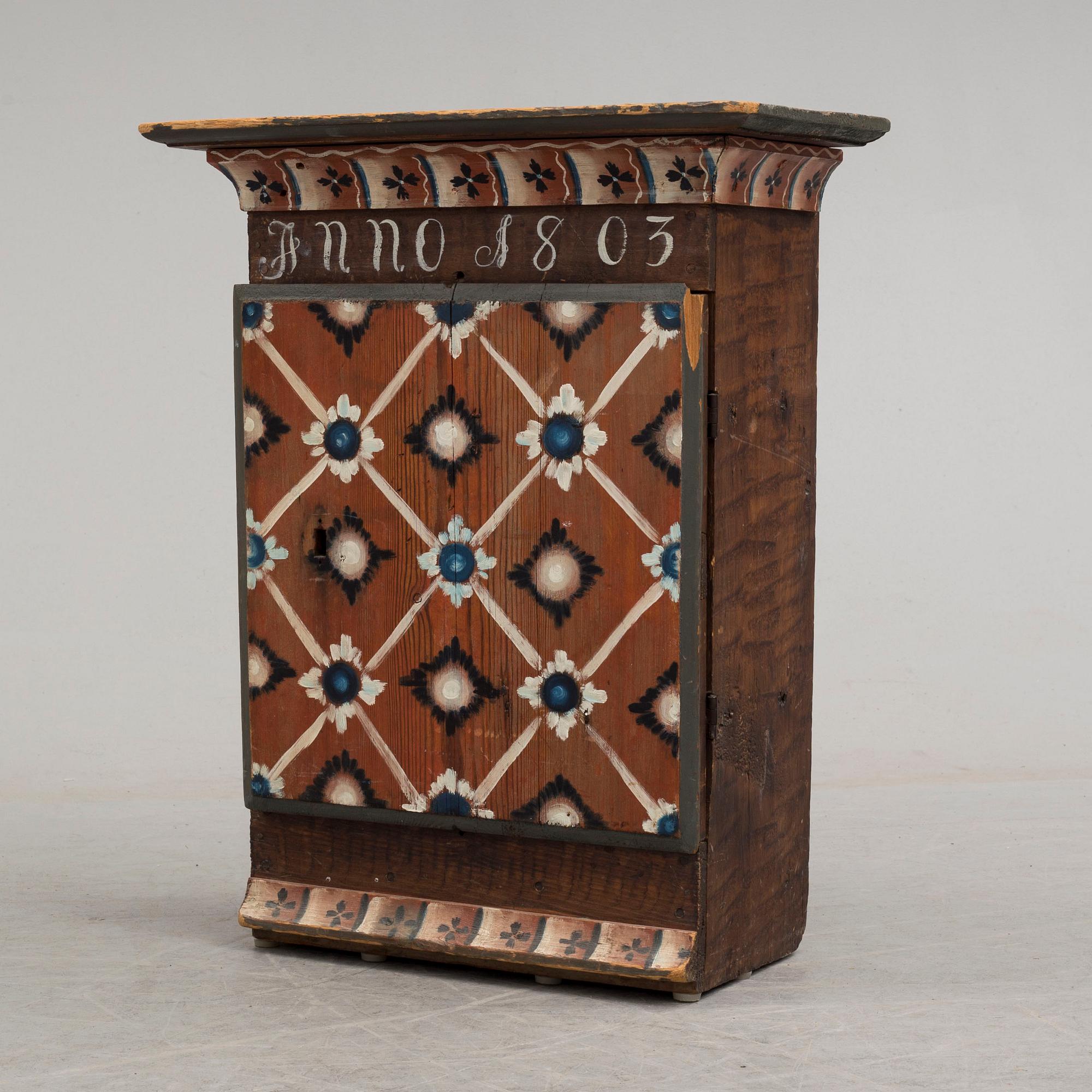 An early 19th century wall cabinet.