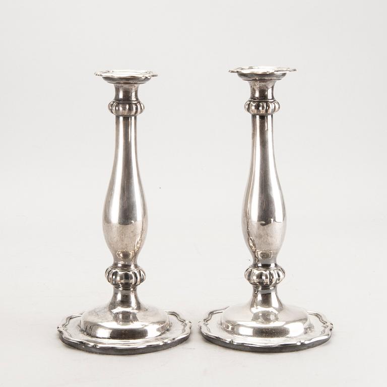 A pair of Austrian silver candle sticks Vienna 1852 weight 626 gr.