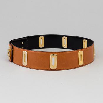 A brown leather belt.