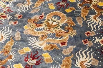 A semi-antique chinese ' Five dragon' silk carpet, c 335 x 254 cm.