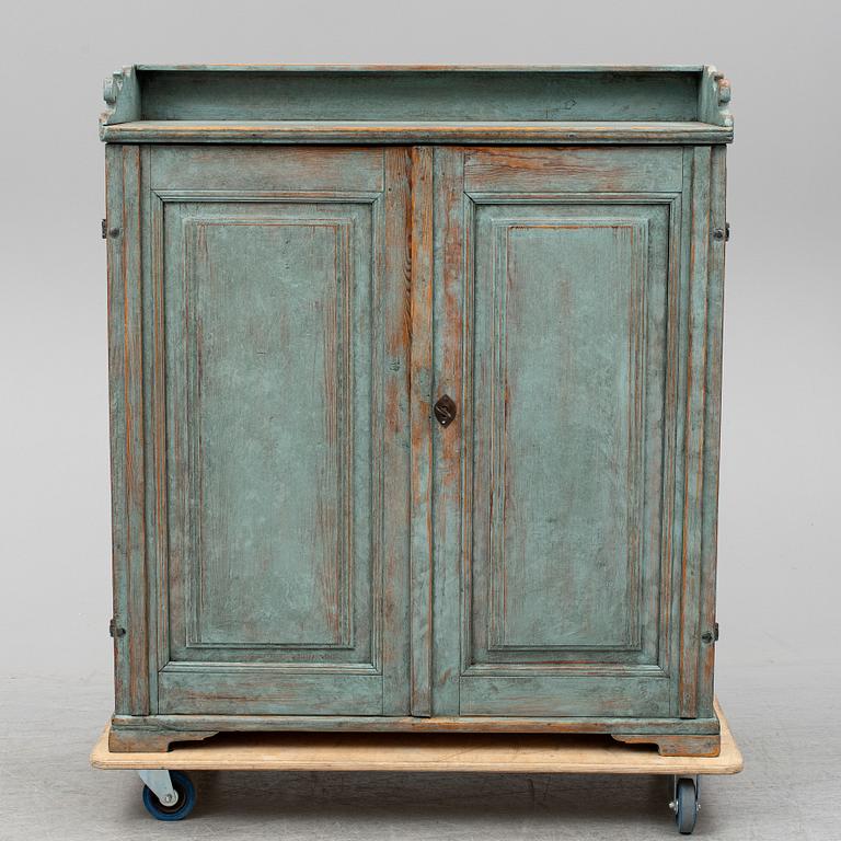 A first half of the 19th century painted cupboard.