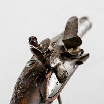 A flintlock gun, 18th century.