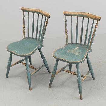 A pair of late 19th century painted chairs.