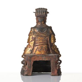 A Chinese gilt lacquered figure of a daoist deity, Ming dynasty (1368-1644).