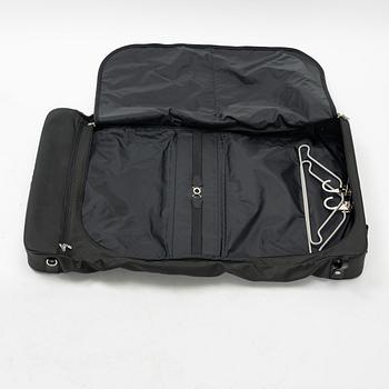 Louis Vuitton, a green canvas and Taiga garment bag.