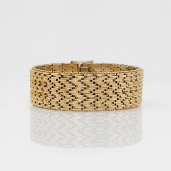 ARMBAND, guld 18K, 1900-talets andra hälft. Vikt ca 63 gram.