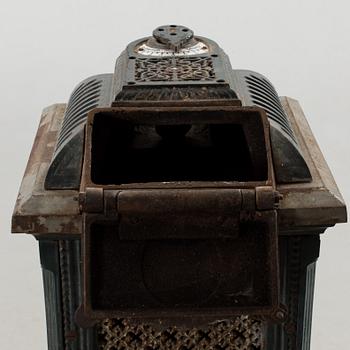 A cast iron stove, around 1900.