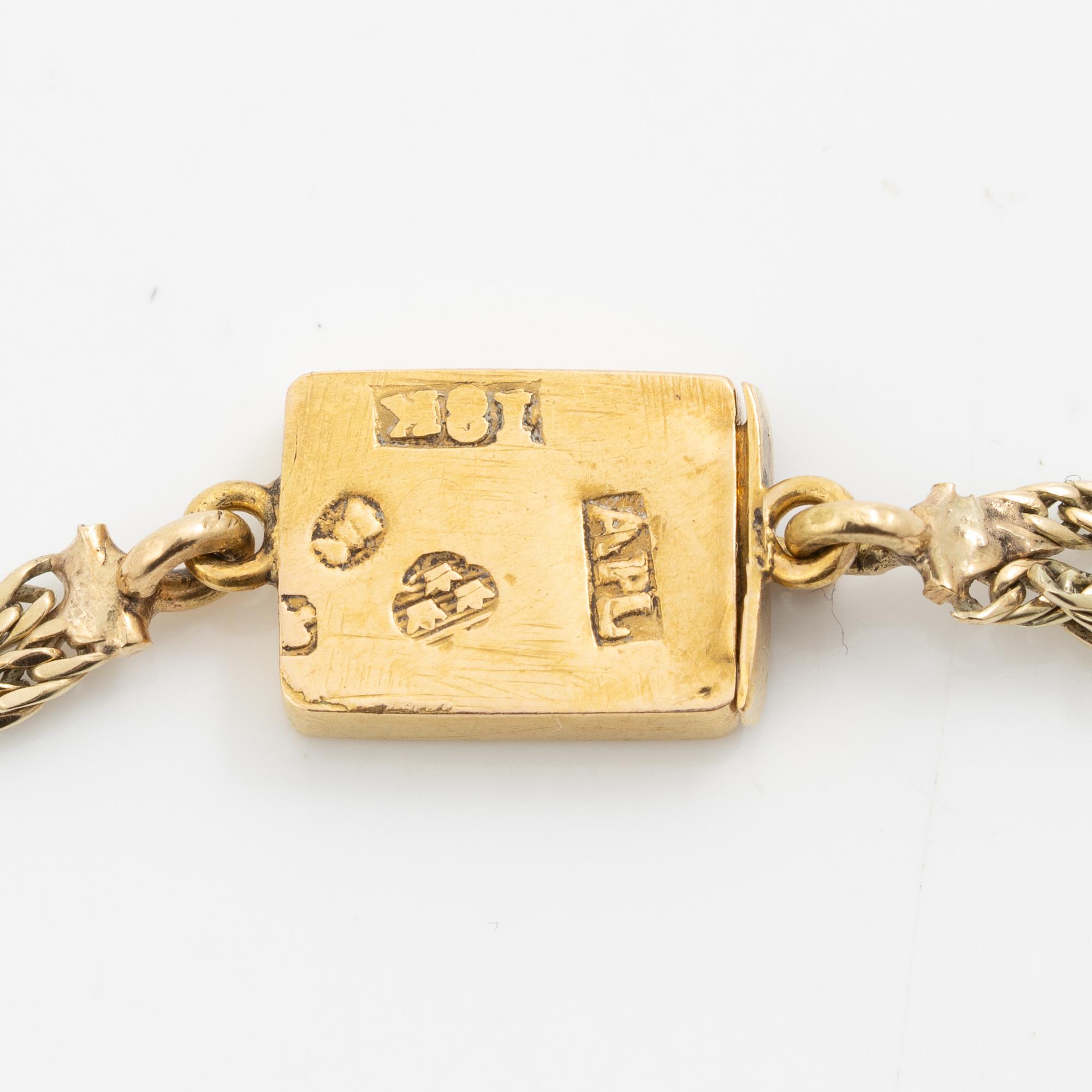 Collier silver och 18K guld med fasettslipat glas samt ett kors silver med ametist och pärlor.