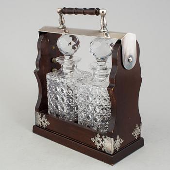 A BOTTLE HOLDER FOR TWO BOTTLES. 20th CENTURY.