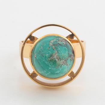 Gold and turquoise ring.