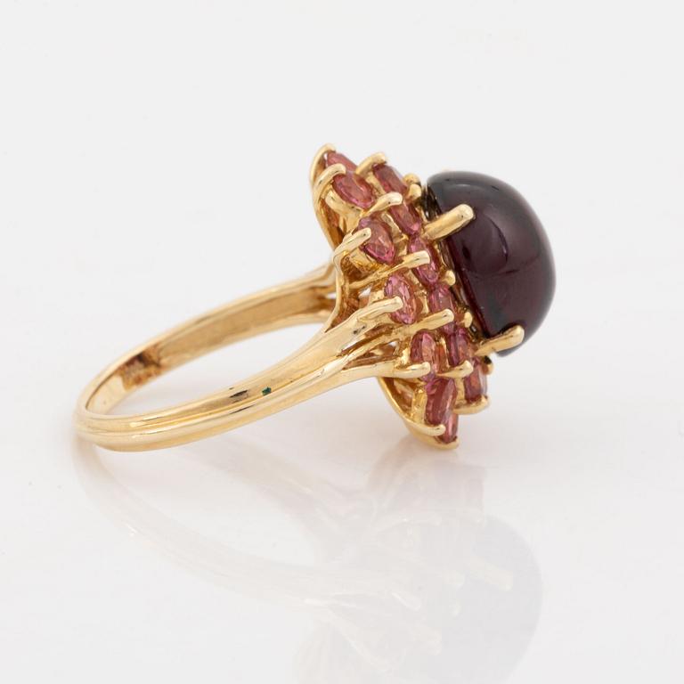 Pink sapphire and cabochon cut garnet ring.