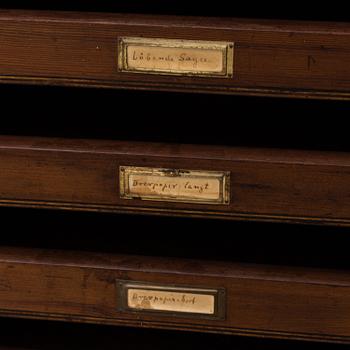 An early 20th Century stained pine office furniture.