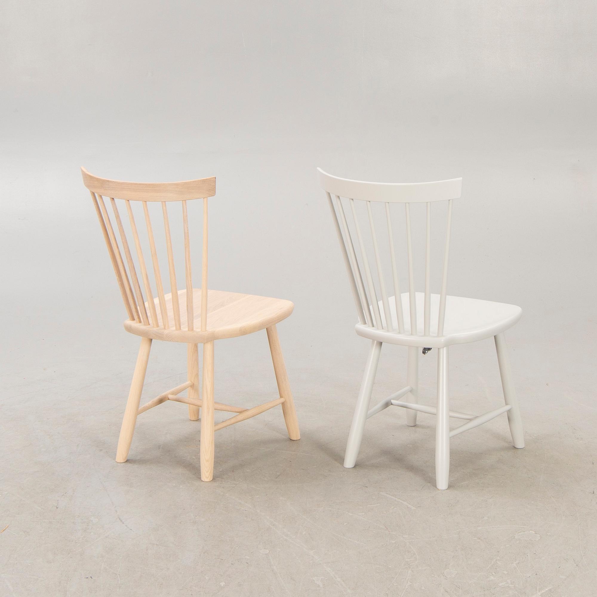 A set of two Carl Malmsten "Lilla Åland" chairs from Stolab, contemporary.