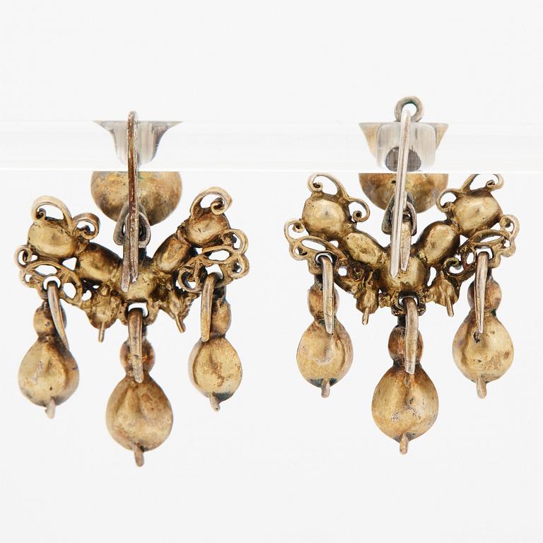 A pair of 18th century rose- and table-cut diamond earrings.