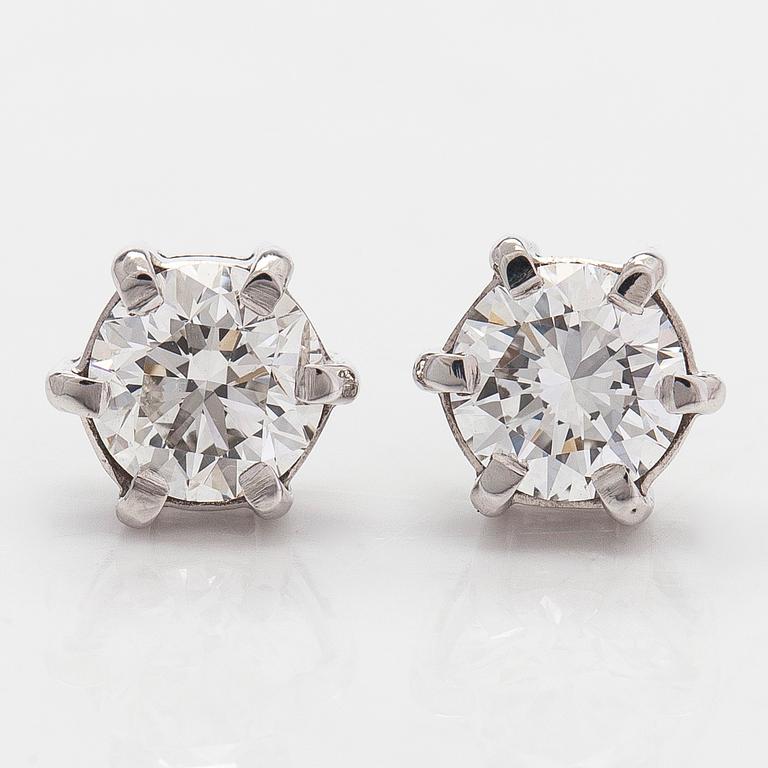 Örhängen, 14K vitguld med briljantslipade diamanter. Medföljande HRD sertifikat.