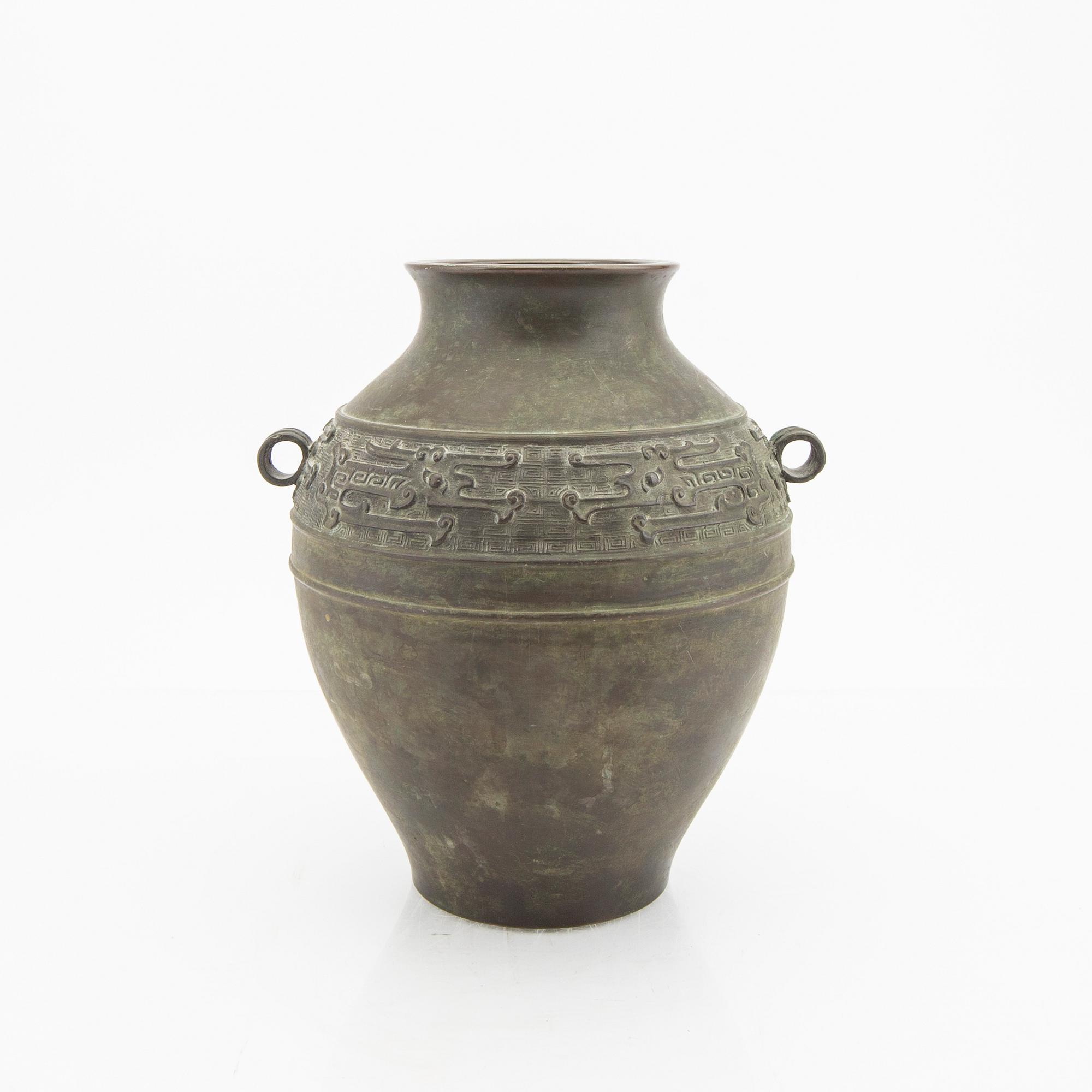 An early 1900s bronze vase.