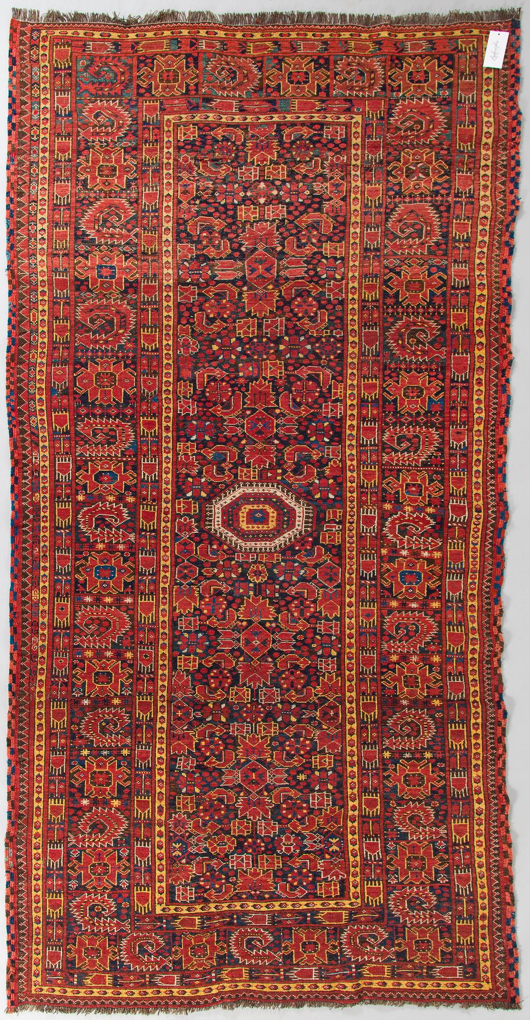 An Antique Beshir carpet, ca 275x145 cm.