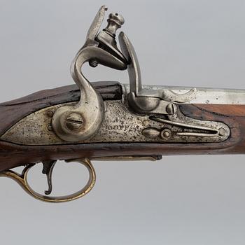 Two British flintlock pistols from around the year 1800.