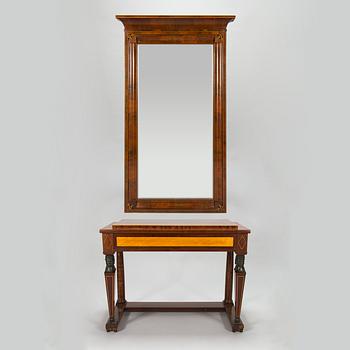 An Empire console table with mirror from around 1810.