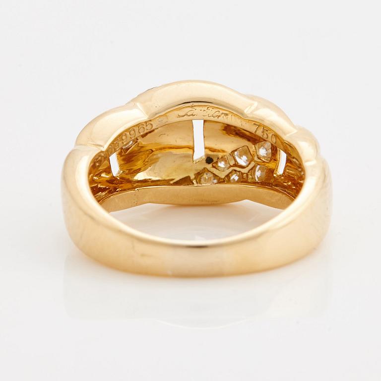 A brilliant cut diamond ring by Cartier.