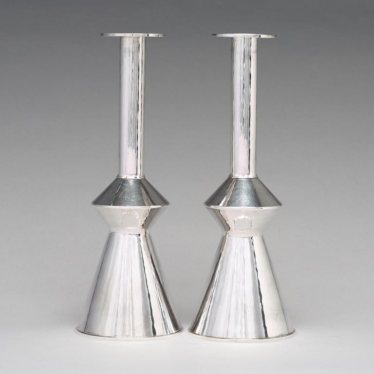 Sigurd Persson, a pair of sterling silver candlesticks, executed by the silversmith Johann Wist, Stockholm 1970.
