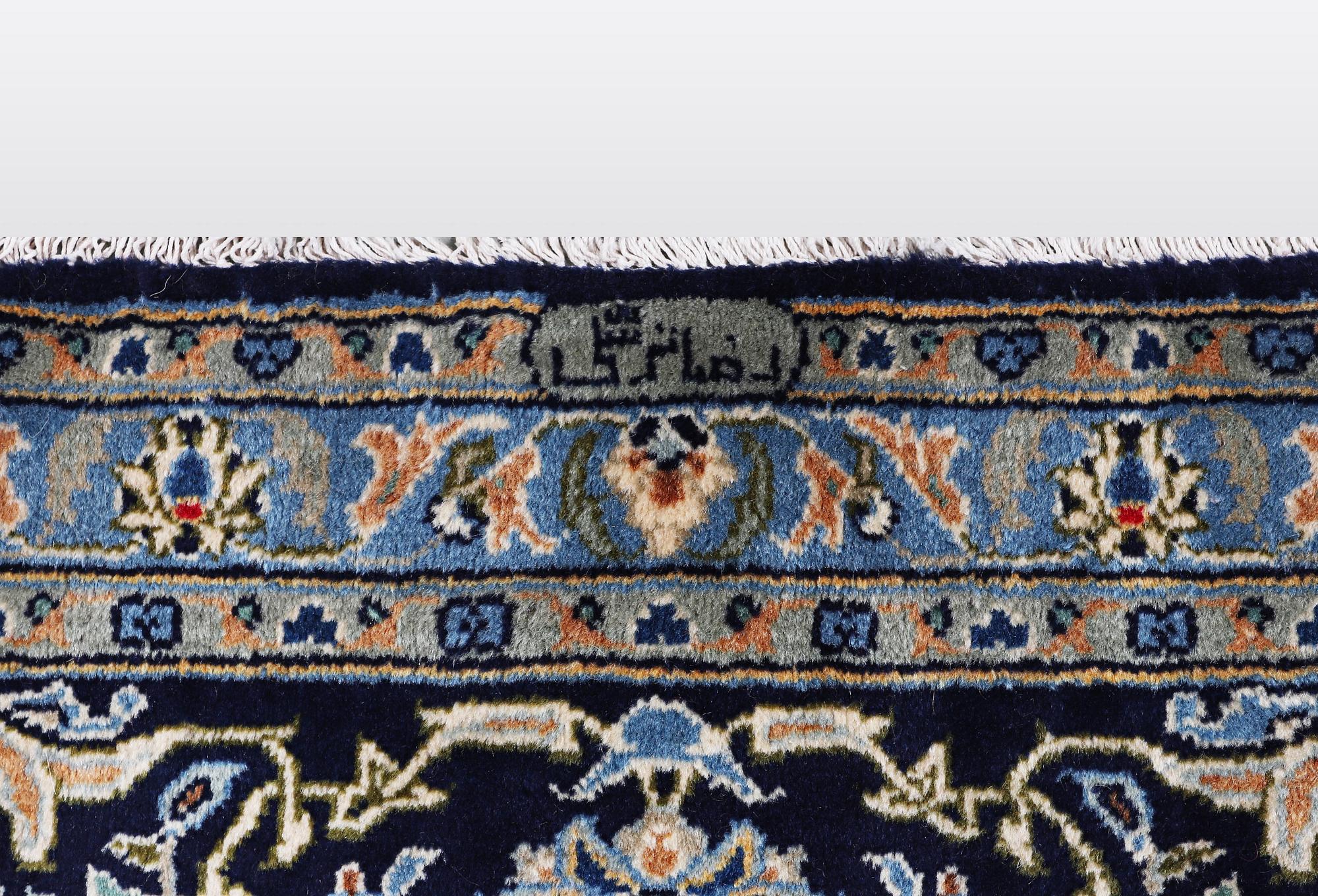 A carpat, Kashan signed Reza Torshi, ca 370 x 250 cm.