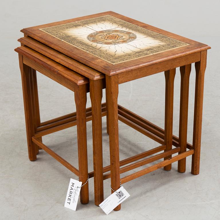 A nest of three 1960/70s tables.