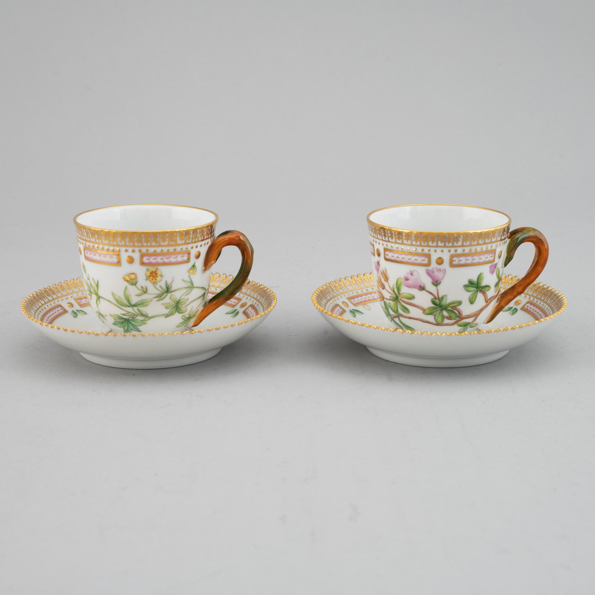 A pair of Royal Copenhagen 'Flora Danica' coffee cups with saucers, Denmark.