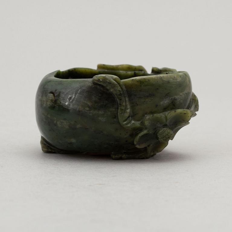 A peach shaped green stone brush washer, Qing dynasty.