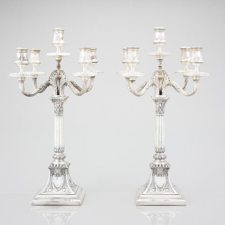 A pair of Swedish silver candelabras, mark of Svea Svensson, Stockholm 1908.