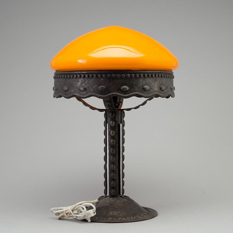 A early 20th century metal table light.