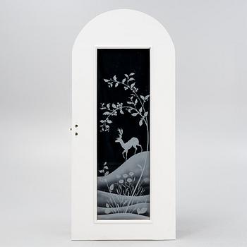 Glössner & Co, a signed glass door.
