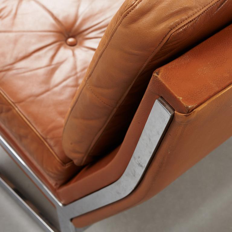 A pair of Poul Nørreklit chromed steel and brown leather easy chairs, Selectform, Denmark 1960's.