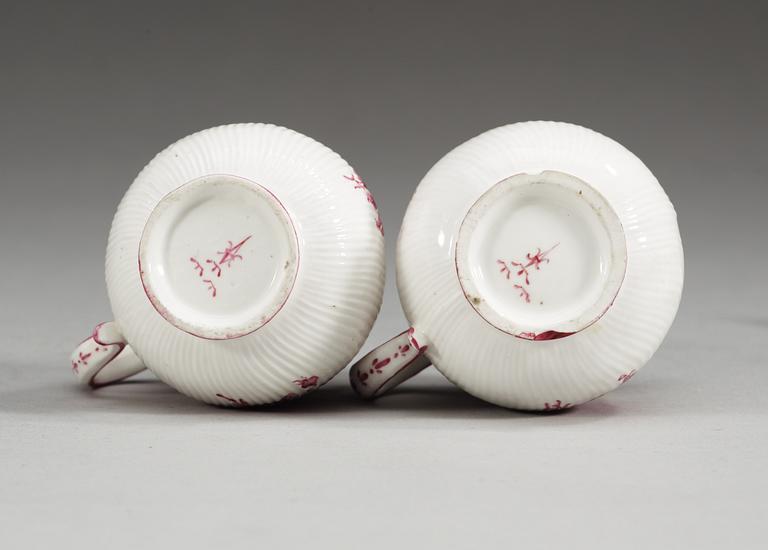 A pair of Swedish Marieberg soft paste custard cups with covers, 18th Century.