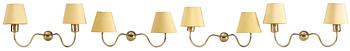 514. A set of 4 Josef Frank brass wall lamps, Svenskt Tenn, model 2435.