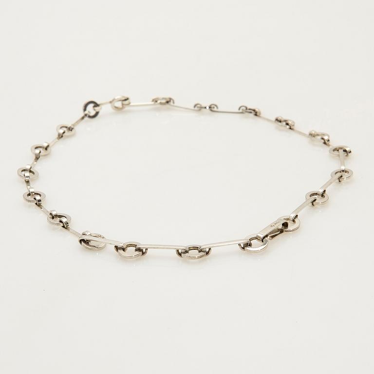 Efva Attling, halsband, ring, ett par örhängen, "Ring Chain", sterling silver.