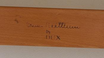 FÅTÖLJ MED FOTPALL, "Pernilla", brännmärkt  Bruno Mattsson by Dux.