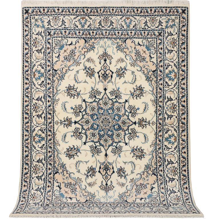 A Nain part silk rug, c. 193 x 148 cm.