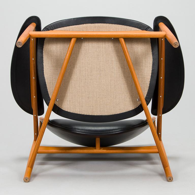 Finn Juhl, a 'Chieftain Chair' / model 'FJ49' armchair for OneCollection House of Finn Juhl, Denmark 2000s.