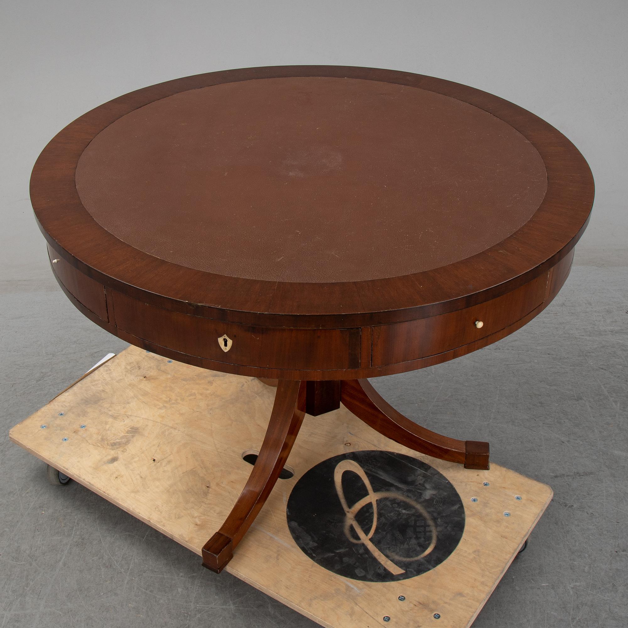A revolving table, mid 19th century.
