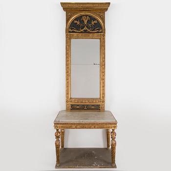 A gilt mirror dated 1816 by CM Fogelgren, linköping with a console table.