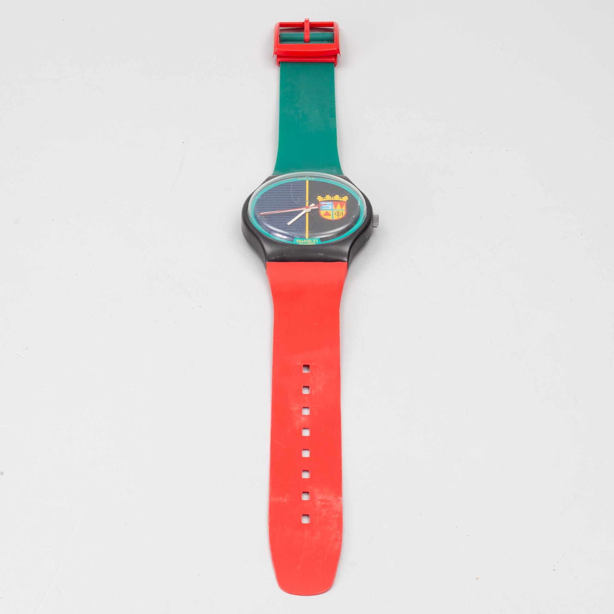 Wall clock, Swatch.