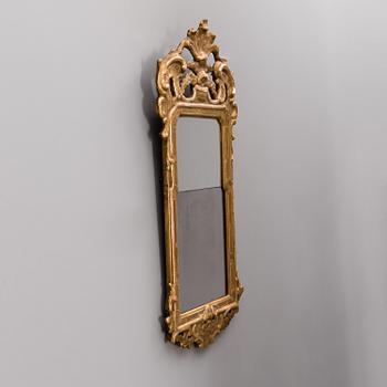 A SWEDISH ROCOCO MIRROR, ca 1770-80.