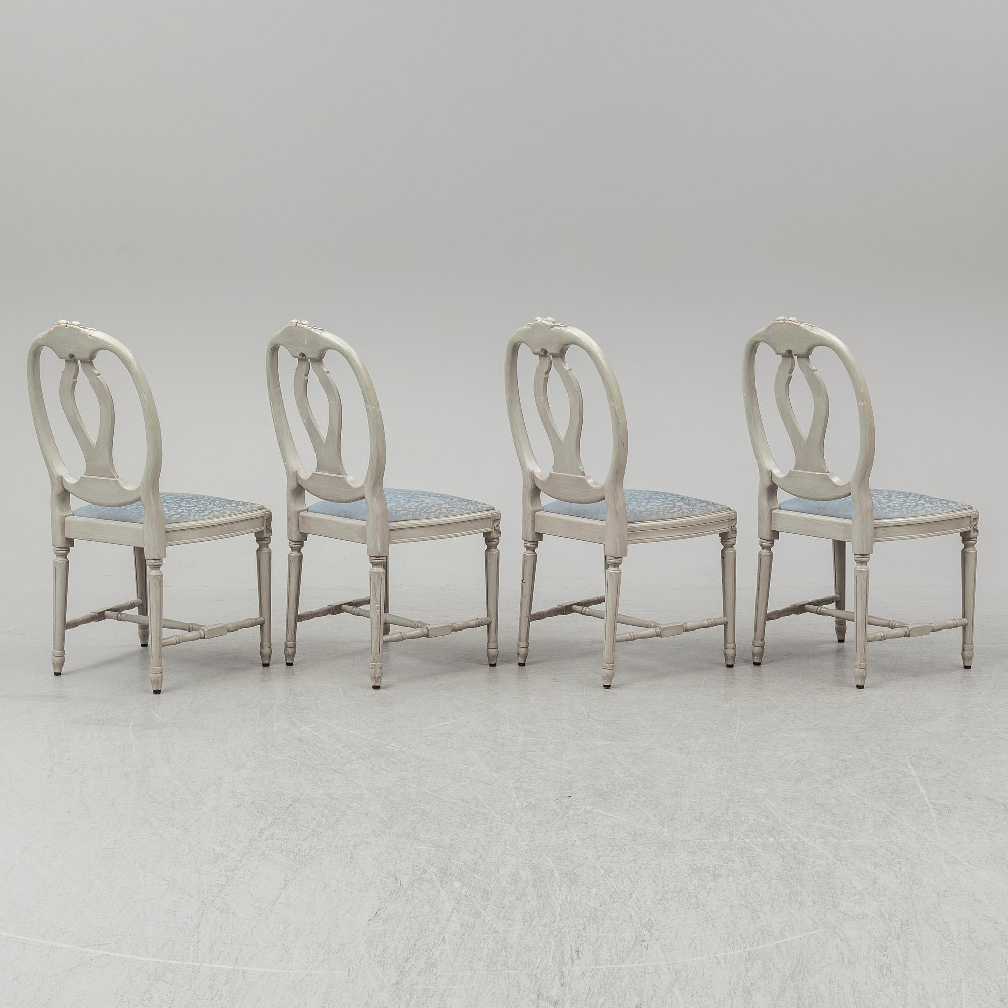 A dining table and four chairs, gustavian style, late 20th century.